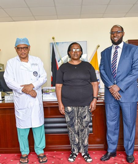 KUTTRH CEO Ahmed Dagane with dr Mishra and a patient