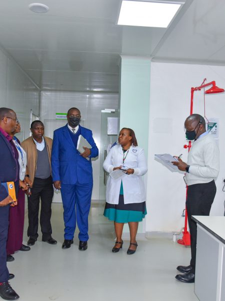 KMPDC officials, KU officials are shown arround the laboratory facilities of KUTRRH