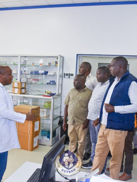 Dr. Eric Mwangi of KUTRRH’s Pharmacy department talks to MCAs from Nakuru County who visited the Hospital on 1st September 2023 for a familiarization tour of the Hospital.