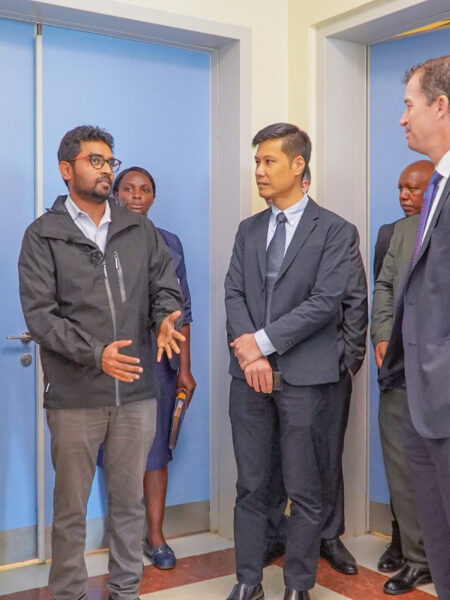 Dr. Harish Nagaraj, Head of Nuclear Medicine at KUTRRH addresses a delegation from AstraZeneca Ltd