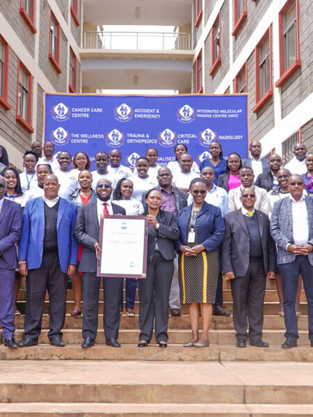 The management of KUTRRH joins members of staff to celebrate the ISO Accreditation of the Laboratory.