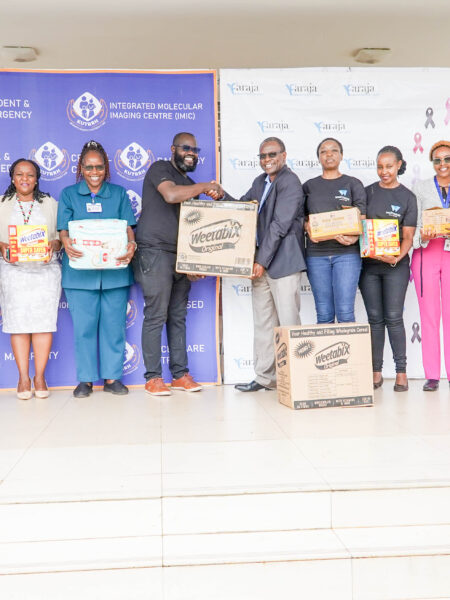 The Hospital staff led by Dr. Kamau receive donations of dry foodstuff by Weitnauer Group courtesy of Faraja Cancer Support Trust for